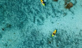 Canoe and kayaks in Polynesia Cook Islands tropical paradise Aitutaki panorama landscape